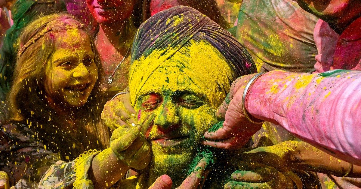 Water Balloons and Bollywood, India covers itself with color on Holi festival