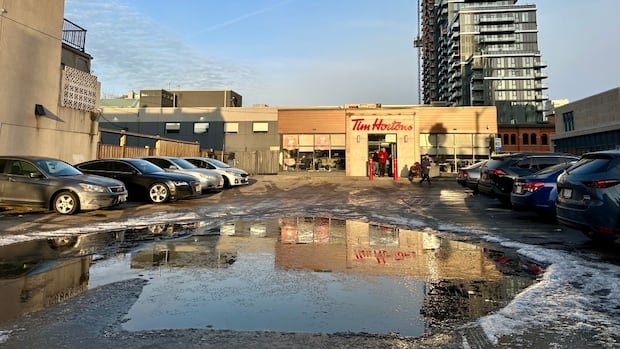 ‘Brutal’ or ‘iconic’? How a giant puddle in a Tim Hortons lot became Hamilton legend ‘Lake Timmicaca’