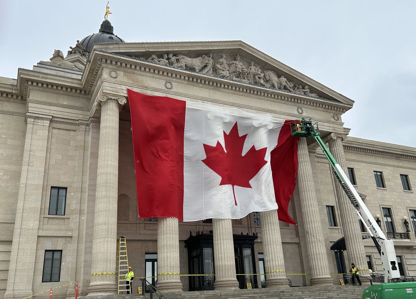 Large flag that was draped outside Manitoba’s legislature is back with football club