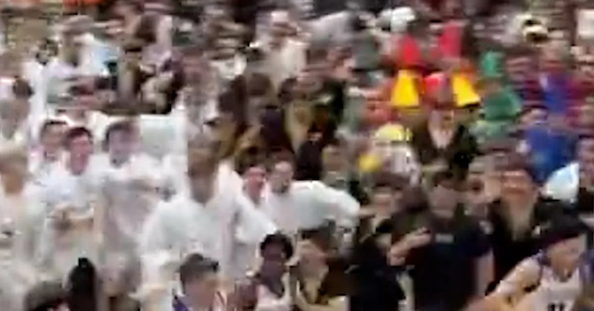 Crowd goes wild at ‘Silent Night’ basketball game