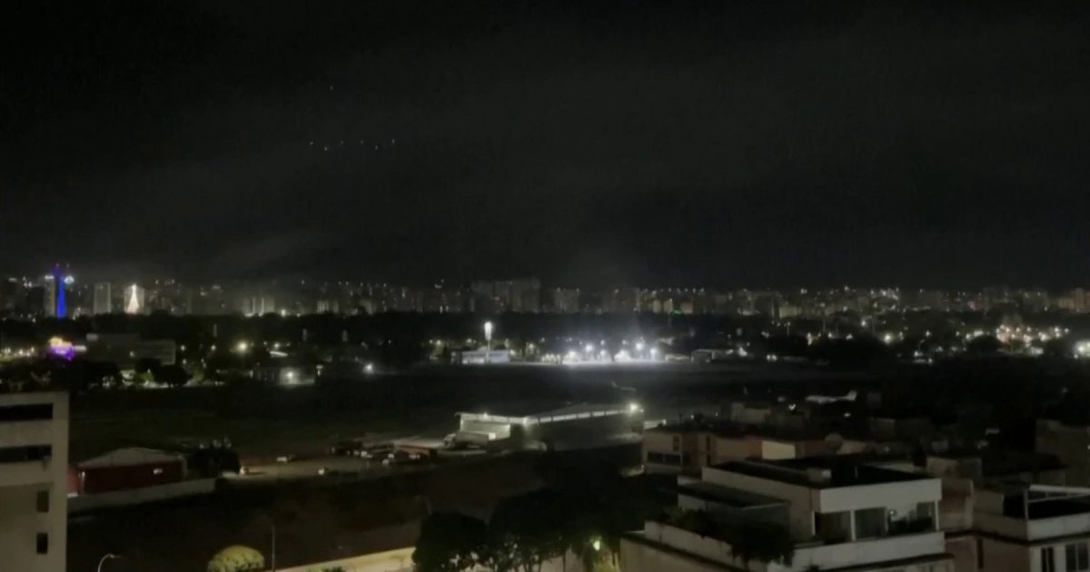 Residents in Caracas report power outages, helicopters overhead as explosions hit