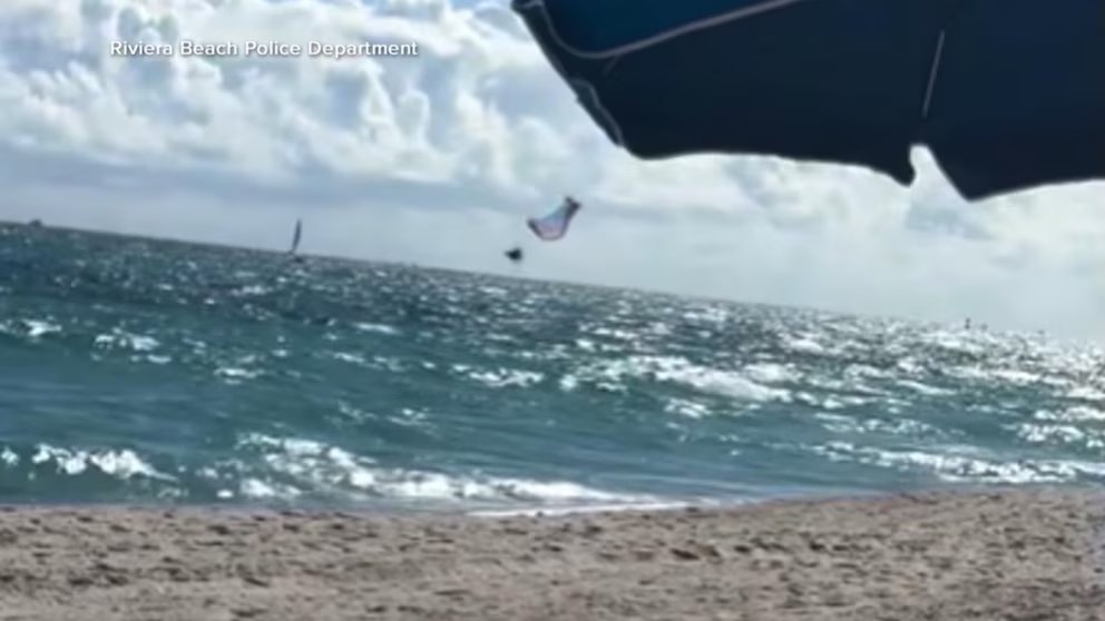 WATCH:  Paraglider survives nearly 500-foot fall into ocean