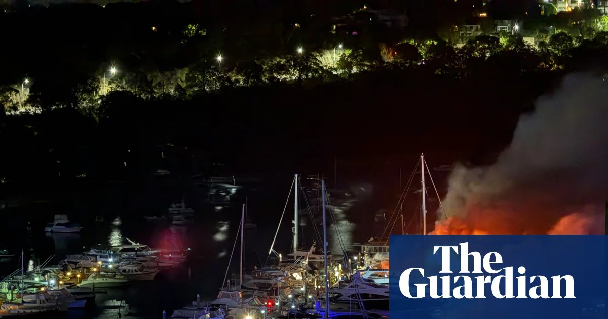 Three luxury yachts sink in Sydney Harbour as fire rips through exclusive Mosman marina | Australia news