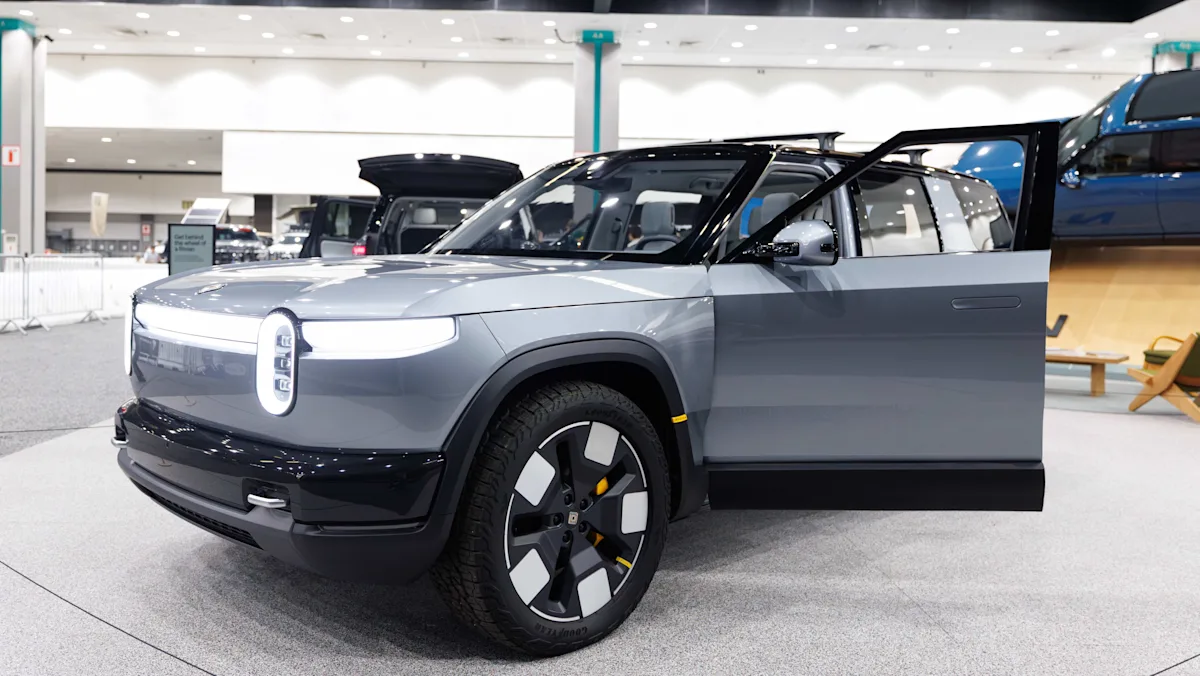 Rivian deliveries decline, Wayfair & RH jump on tariff delay