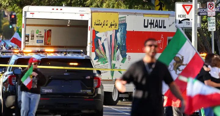 Protesters try to attack driver after truck speeds through L.A. anti-Iran protest – National