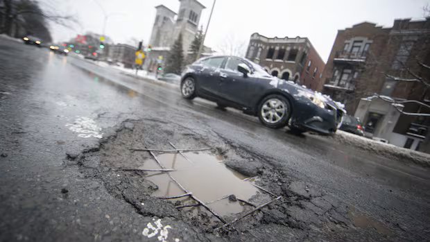 ‘2 tires, 2 flats’: Montreal mayor shares her own pothole horror story