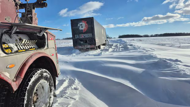 150 vehicles abandoned in weekend blizzard that saw snowmobilers and farmers helping