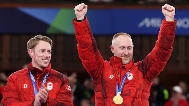 With gold medal around his neck, Canadian skip Jacobs has a message for the haters