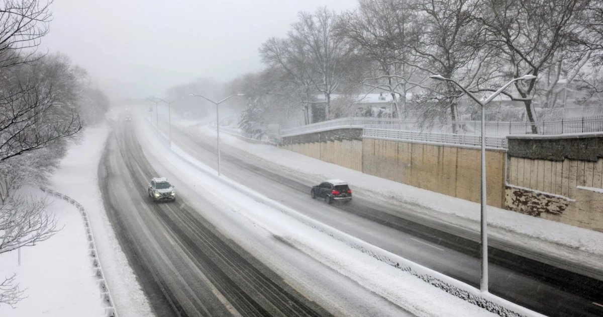 Dangerous road conditions and power outages as blizzard barrels up East Coast