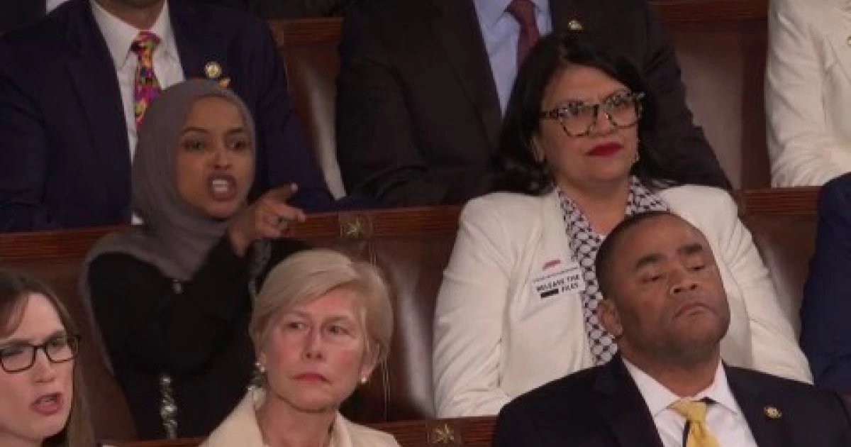 Lawmakers stand in support of immigration enforcement while others shout