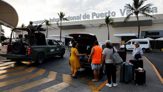 Canadian travellers with trips planned to Mexico weighing whether or not to stay home