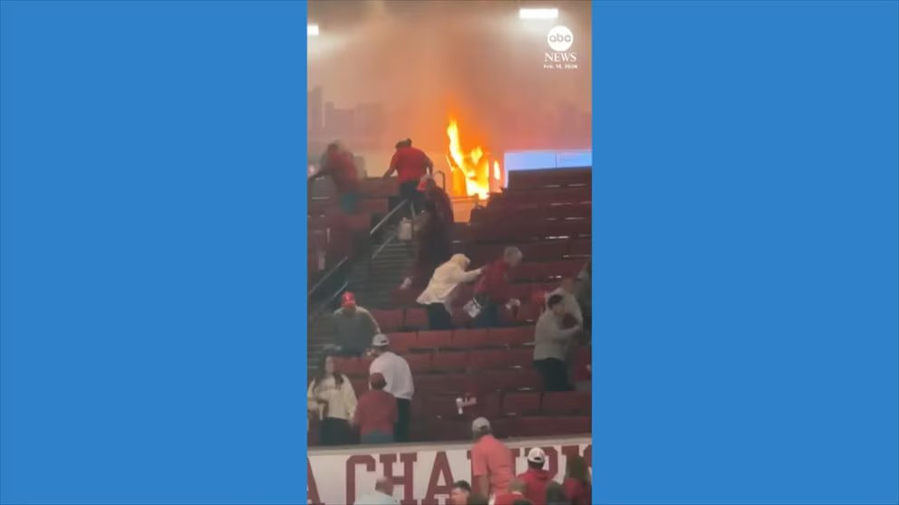 Video Popcorn machine catches fire during college basketball game