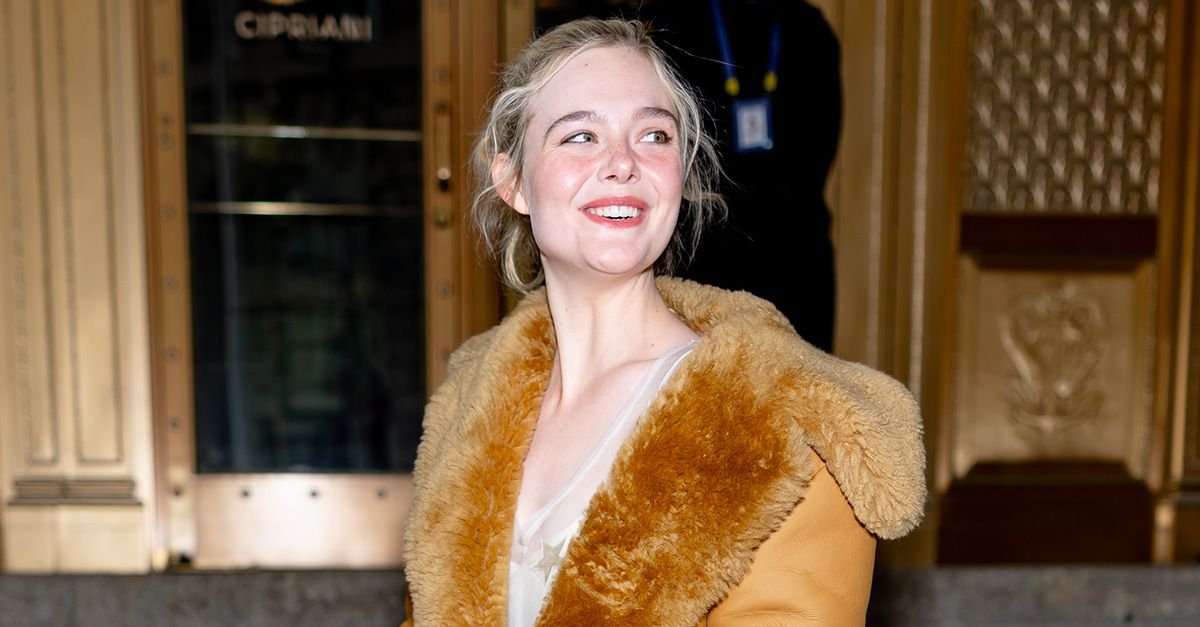 Elle Fanning Wore a Tiny Coach Book Bag Charm