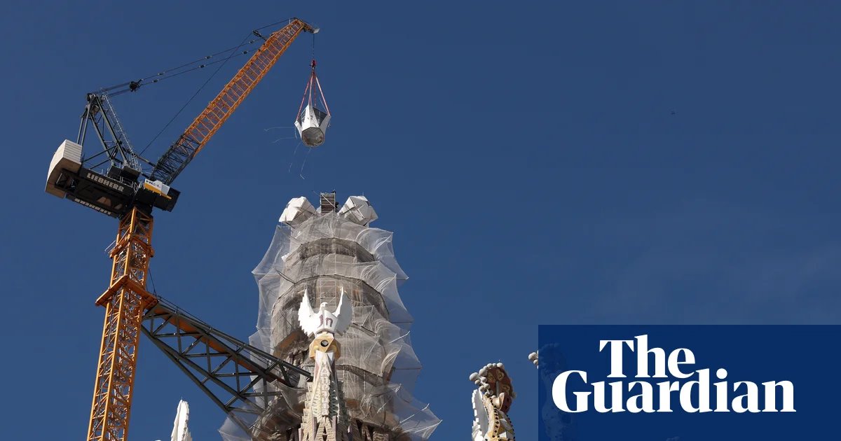 ‘A joyful day’: final piece of Sagrada Familia’s central tower put in place | Barcelona
