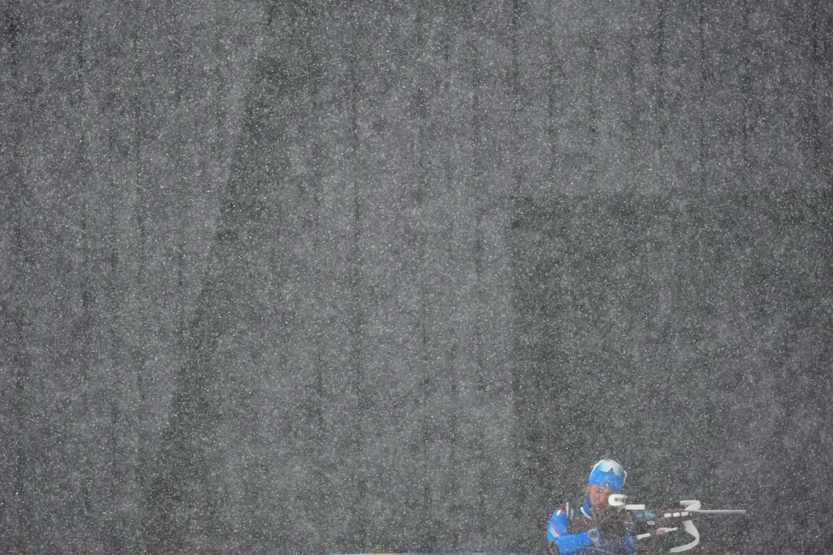 Athletes and fans brave the snow and cold at the Winter Games, in photos