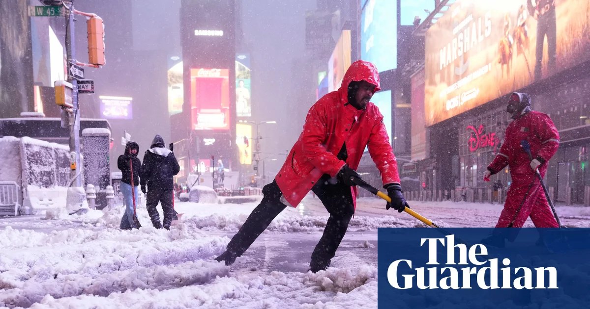 Millions face road travel bans as snow blankets New York and north-east US | US weather