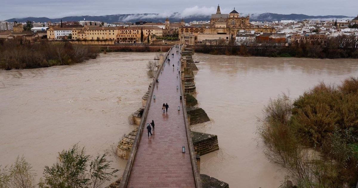Rescuers search for woman swept away by river as Spain and Portugal battle Storm Leonardo