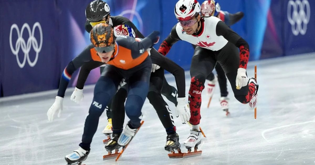 Canada's William Dandjinou gets caught in the short-track chaos, and another medal disappears