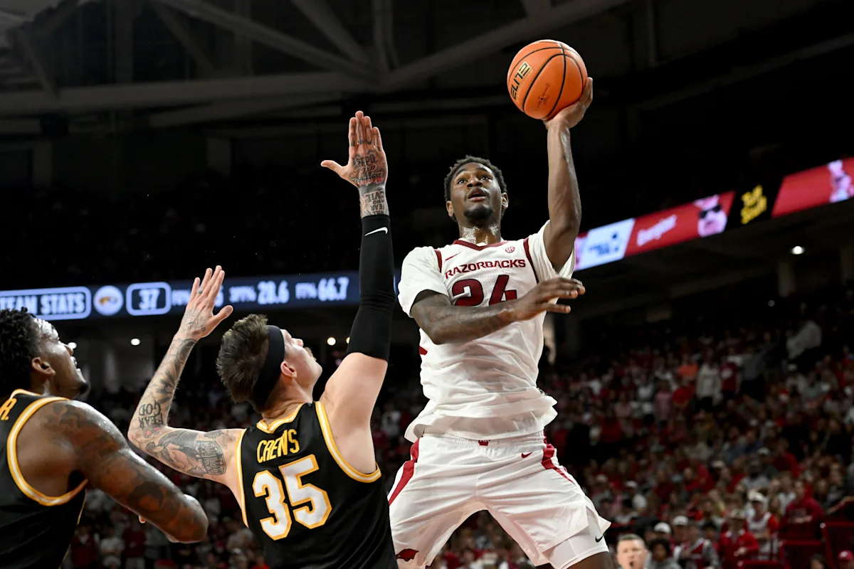 Richmond and Acuff power No. 20 Arkansas to a 94-86 win over Missouri