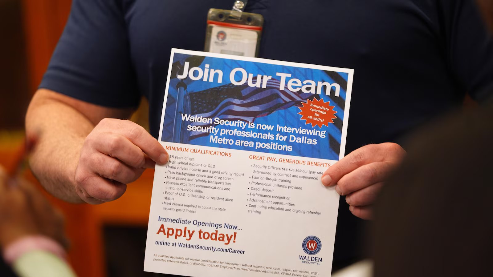 US applications for jobless aid fall to 206,000 last week as layoffs remain low