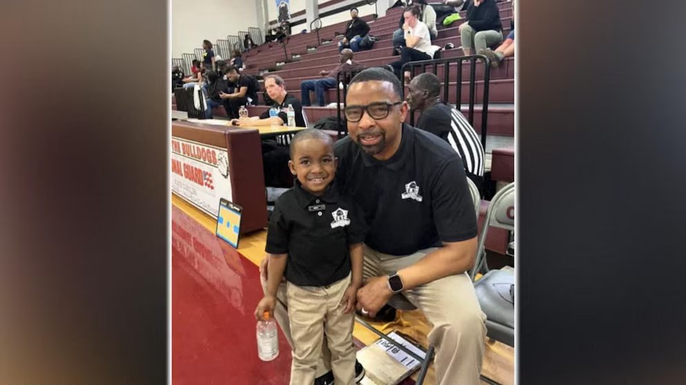 WATCH:  6-year-old son helps father coach hoops team