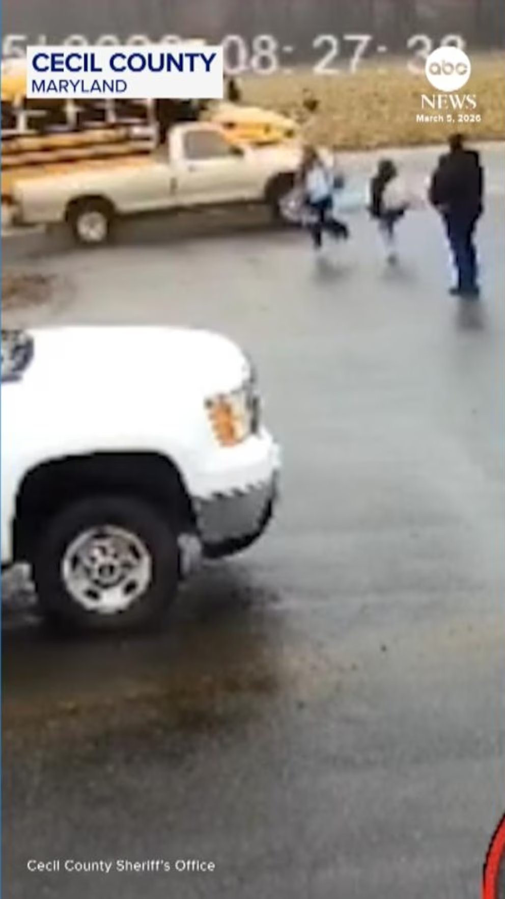 Video Pickup truck narrowly avoids children boarding school bus