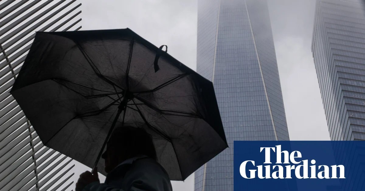 Half a million lose power as storm lashes US from midwest to east coast | US weather