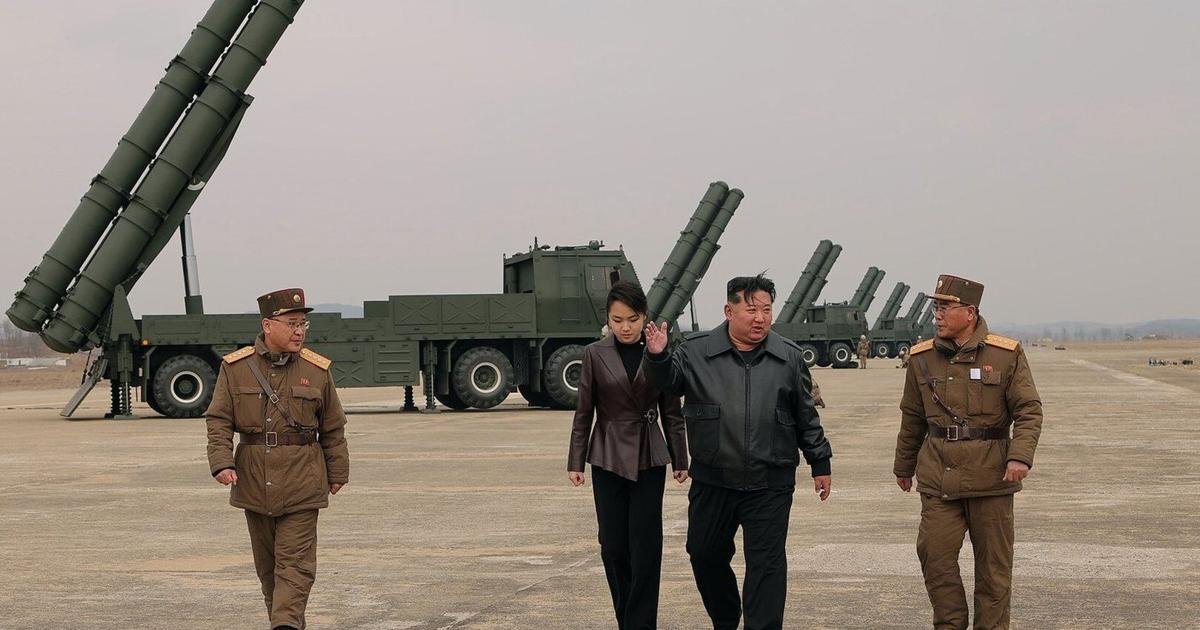 North Korean leader Kim observes test of rocket launch systems with his daughter