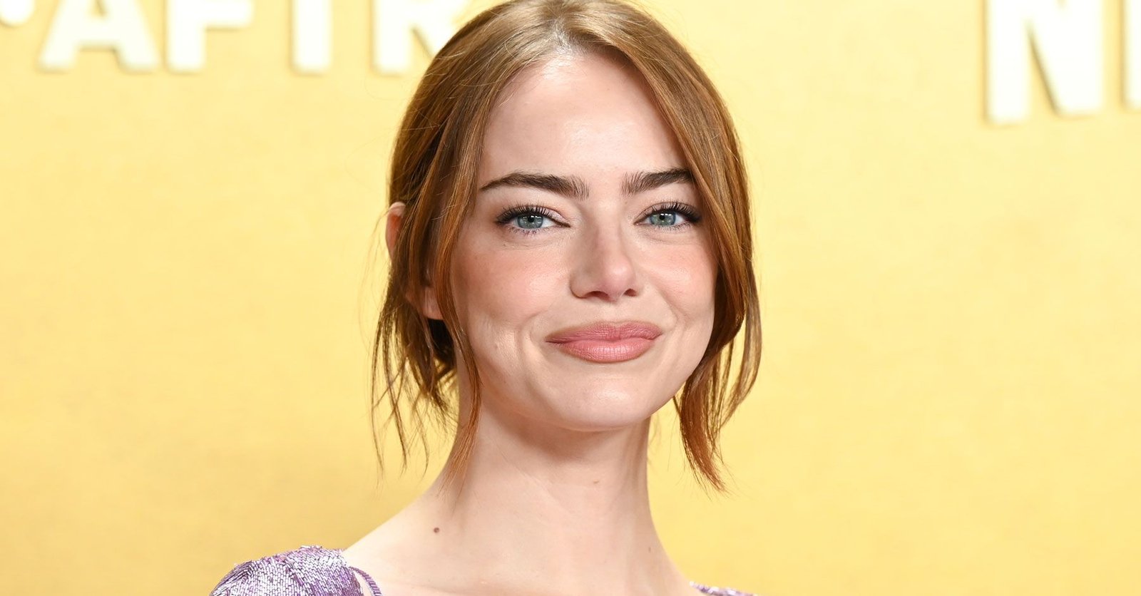 Why Emma Stone’s Red Carpet Cardigan Is Dividing the Internet