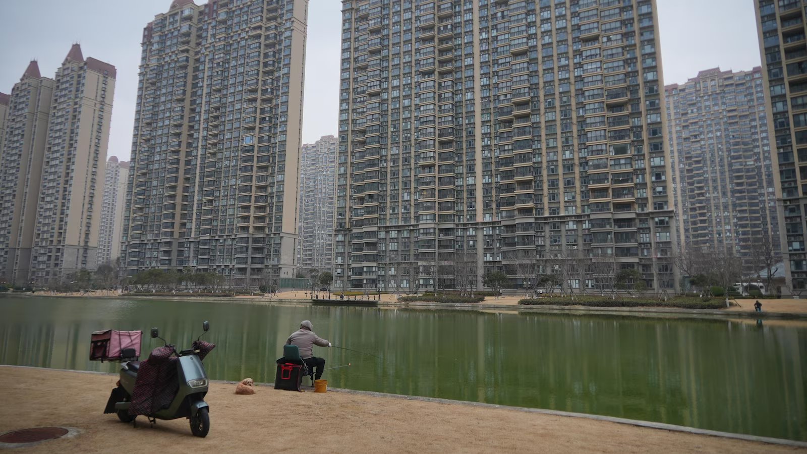 As China’s economy slows, some are snapping up cheap apartments to ‘retire’ early