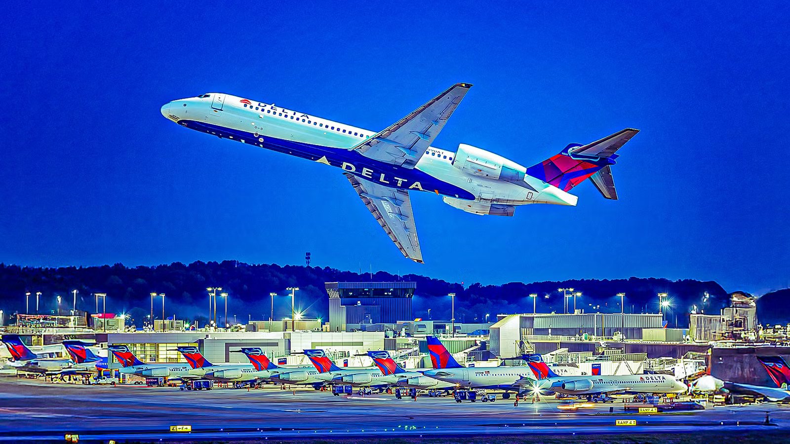 Watch: Unfazed Delta Agent Ignores Passenger Hitting Herself In Bizarre Meltdown