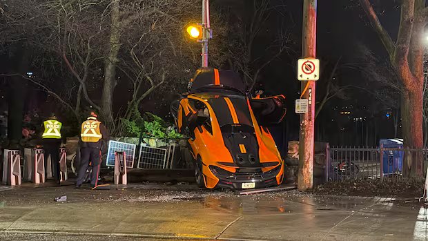 McLaren driver charged after supercar slams into wall, bike rack near Casa Loma