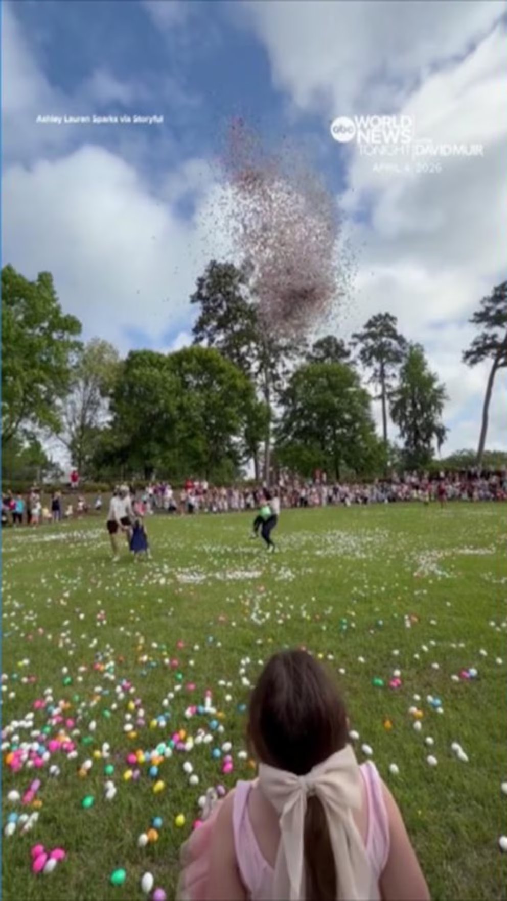WATCH:  Woman rescues toddler moments before hundreds of Easter eggs drop