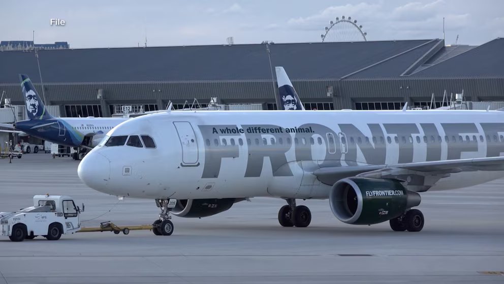 WATCH:  Close call between passenger jet, 2 trucks on tarmac at LAX