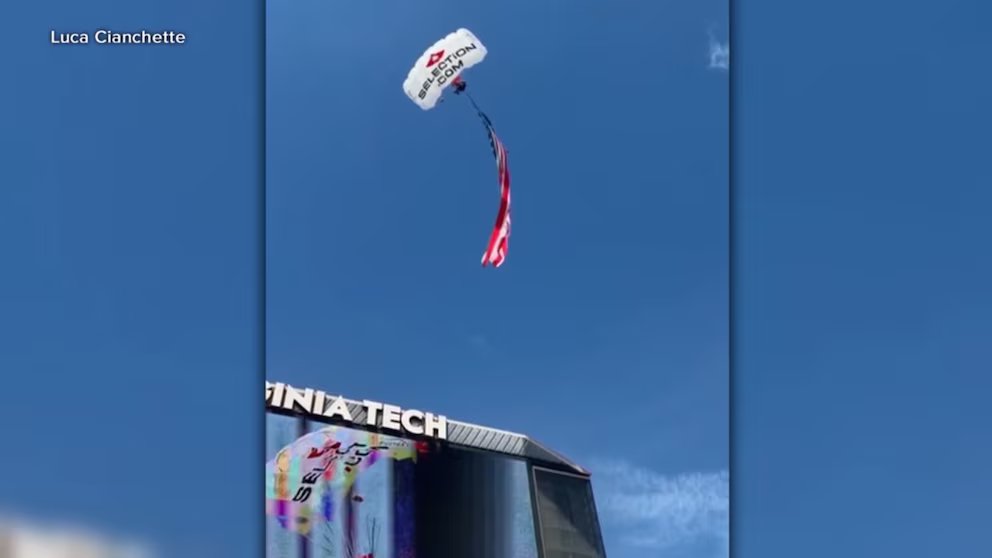 WATCH:  Skydiver speaks out after crashing into scoreboard at college football game