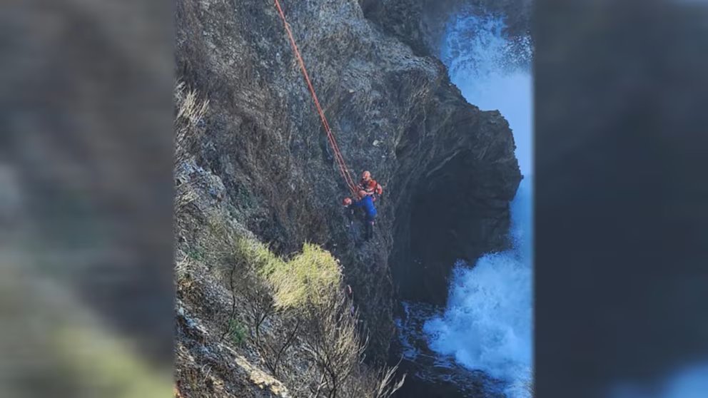 WATCH:  Daring rescue for 2 families stuck on cliff