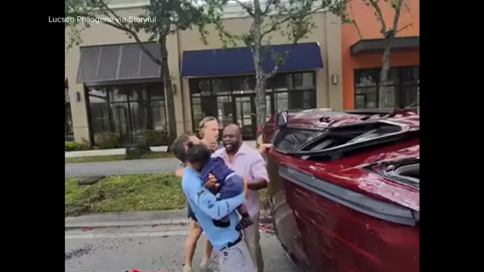 WATCH:  Good Samaritans in Florida rescue family, including baby, after car crash