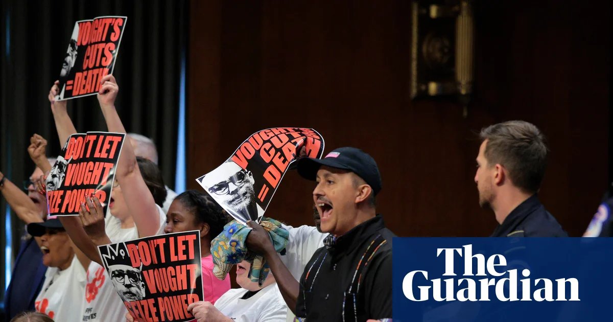 ‘Vought cuts kill people’: Aids activists interrupt Trump budget chief hearing | Trump administration