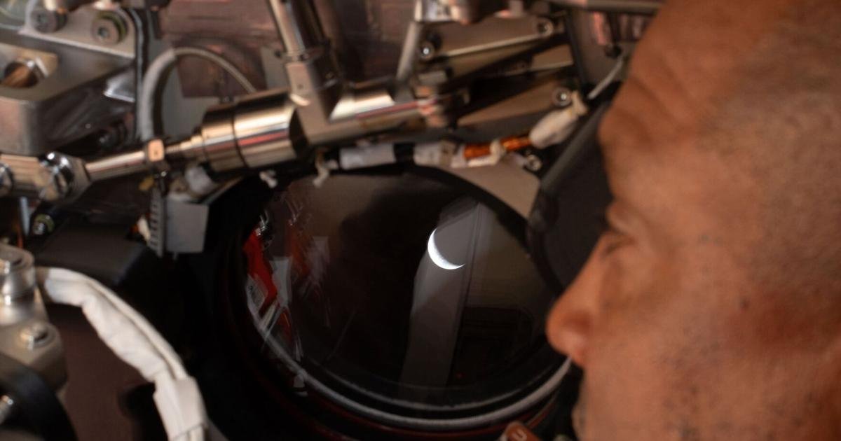 Artemis II crew flies past moon, travelling farther from Earth than any humans before