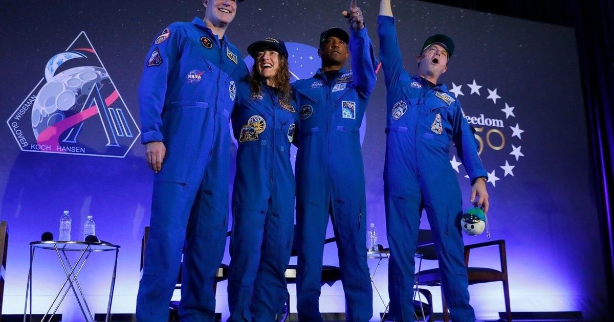 Artemis II's moon-traveling astronauts return home to cheers after a record-breaking trip