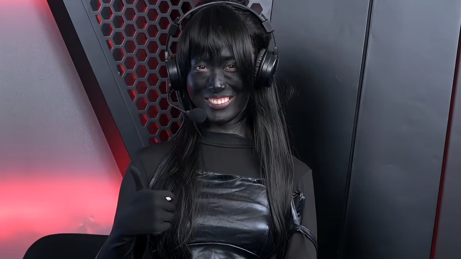 Esports host covers herself in black paint after criticism over “revealing” outfit