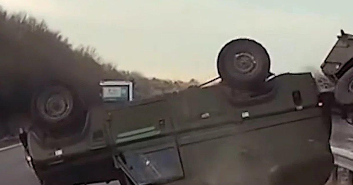 Military truck rolls over on highway in U.K.