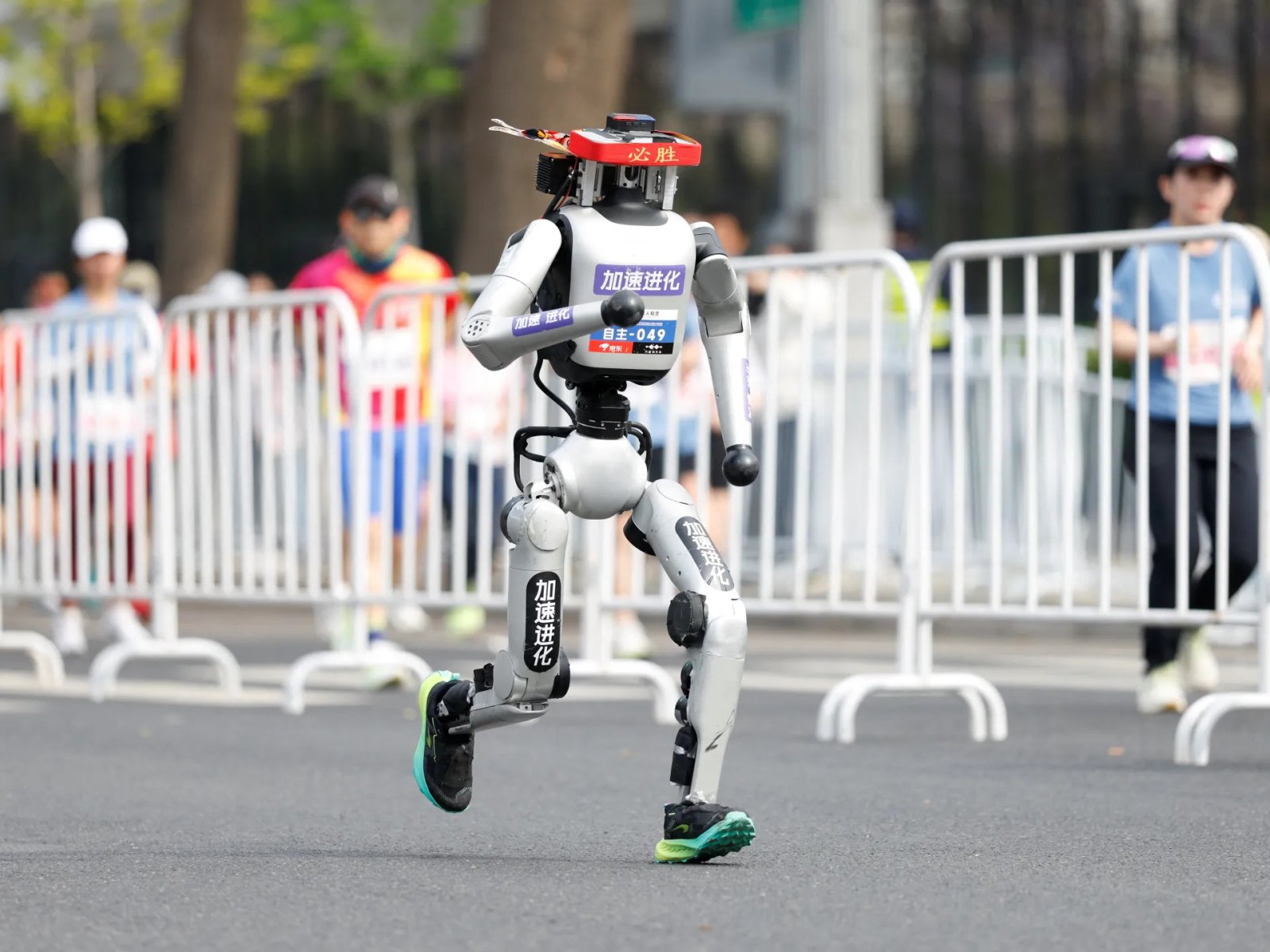 Humanoid robots speed past humans in Beijing half-marathon | Science and Technology