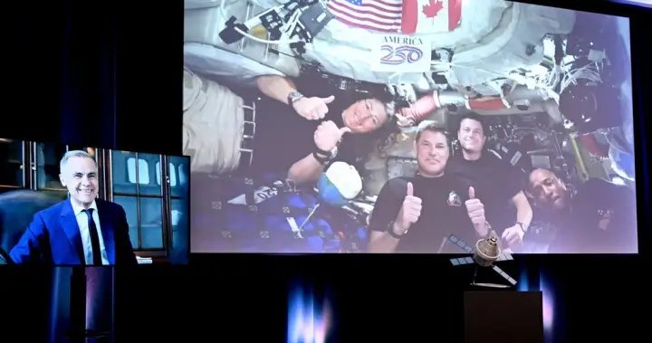 Carney praises Hansen, calls hearing French from space a point of pride