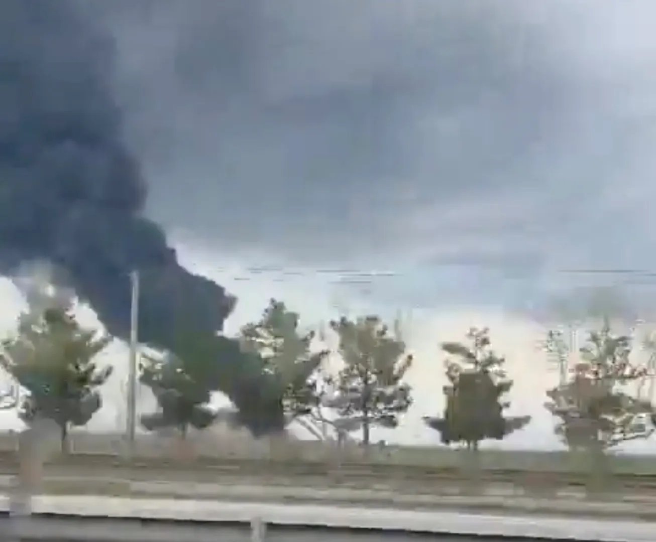 Smoke rises over Mashhad, Iran, following strike near airport