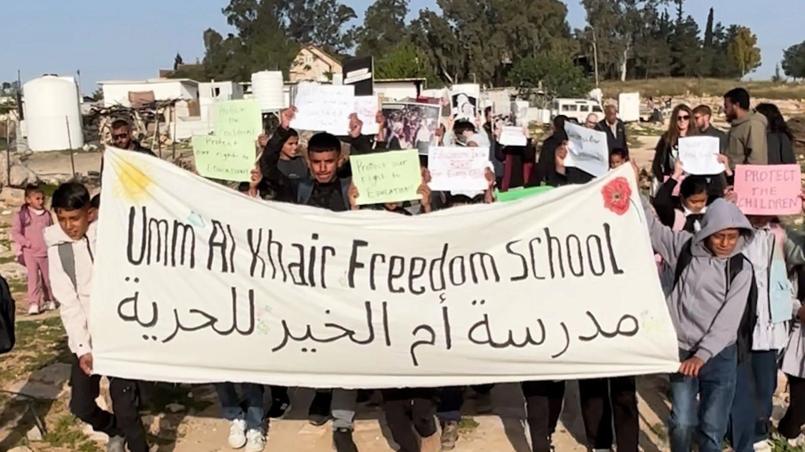 Palestinian children protest against siege on their school | Education