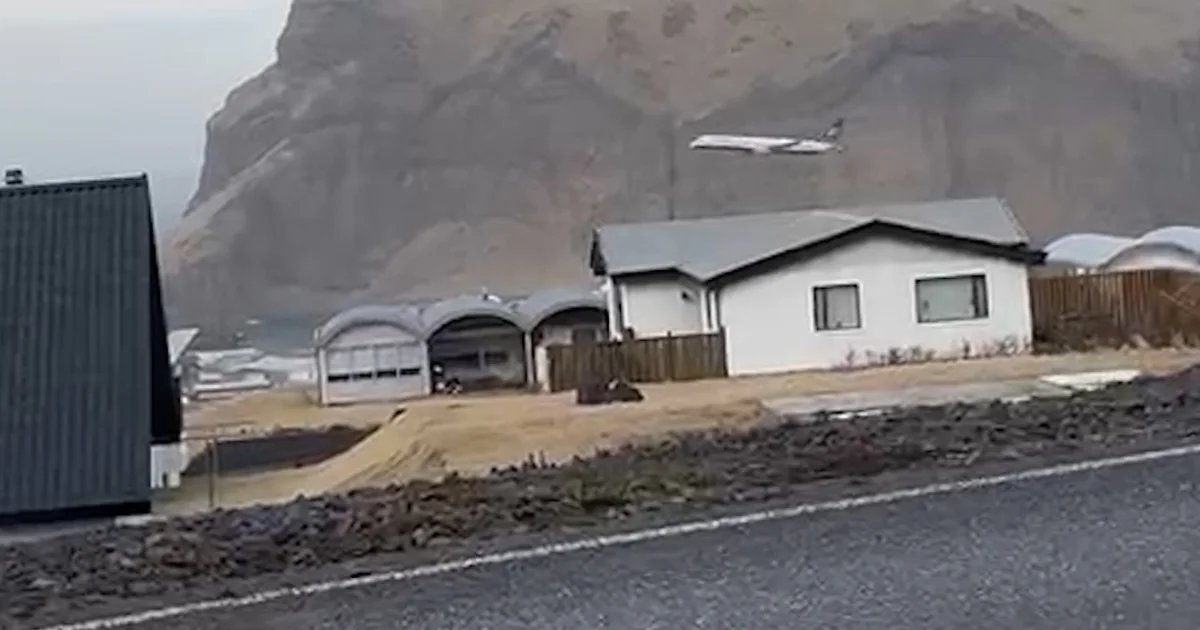 Boeing 757 conducts low flyover above an Icelandic town