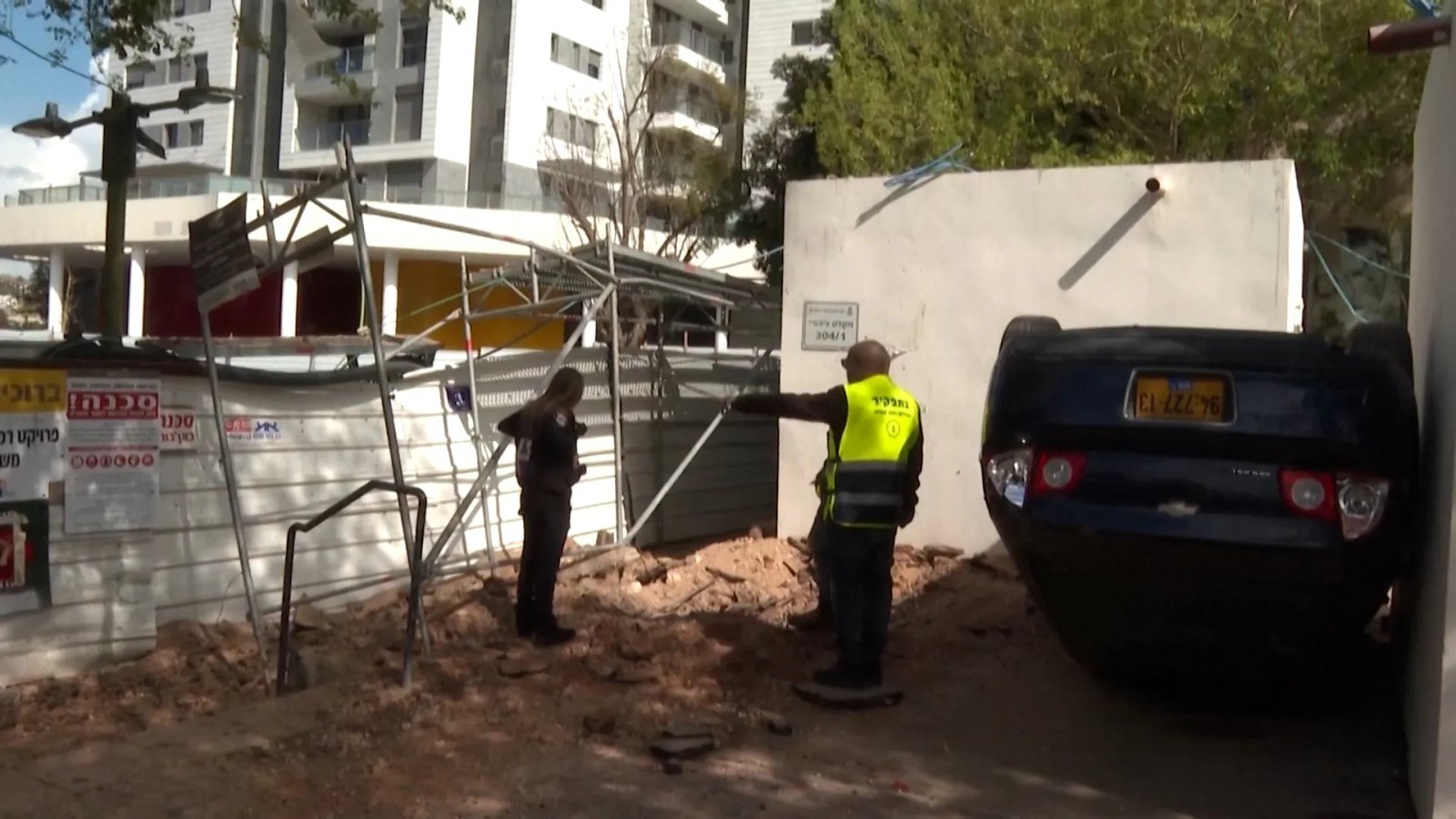 Iranian missile strike damages cars and street in Israel | US-Israel war on Iran News