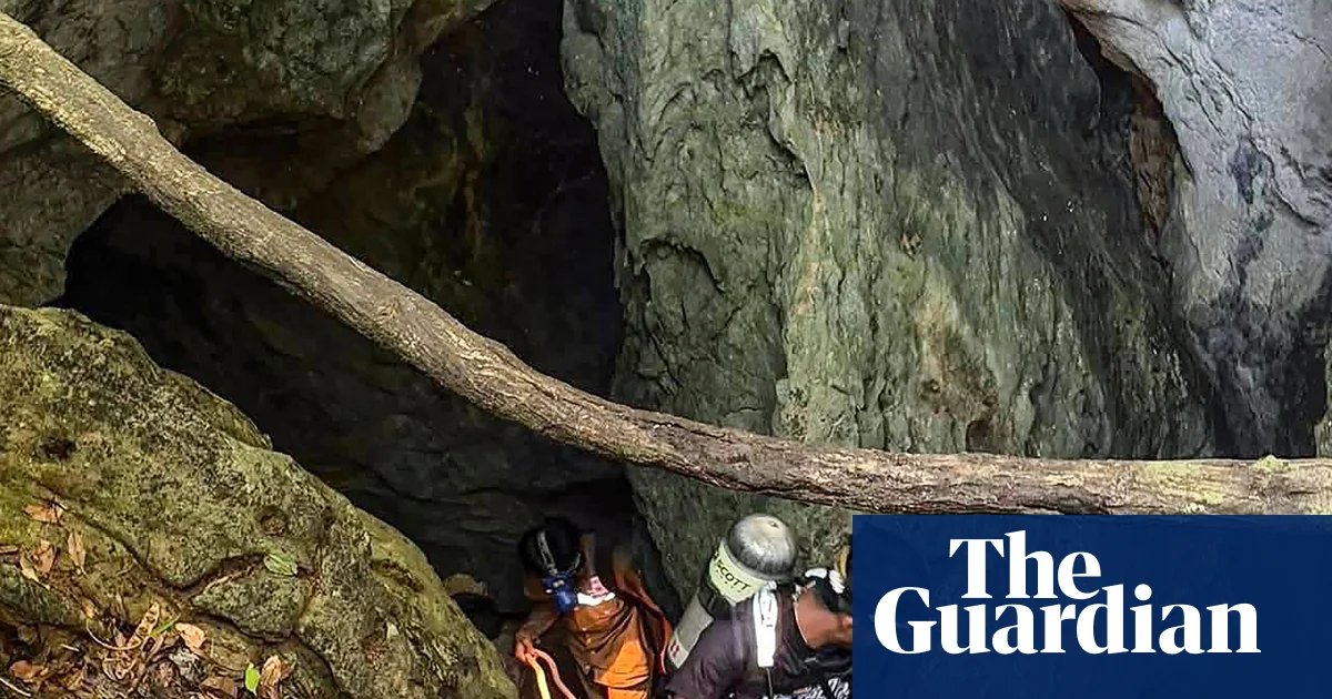 ‘Essentially diving in coffee’: Australian diver among team rushing to rescue people trapped in flooded Laos cave | Laos