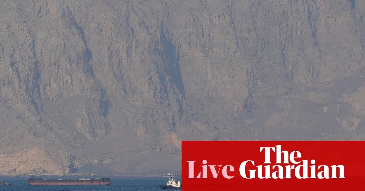 Middle East crisis live: tanker hit by ‘projectiles’ in strait of Hormuz after Trump says US will help ‘guide’ stranded ships | US-Israel war on Iran